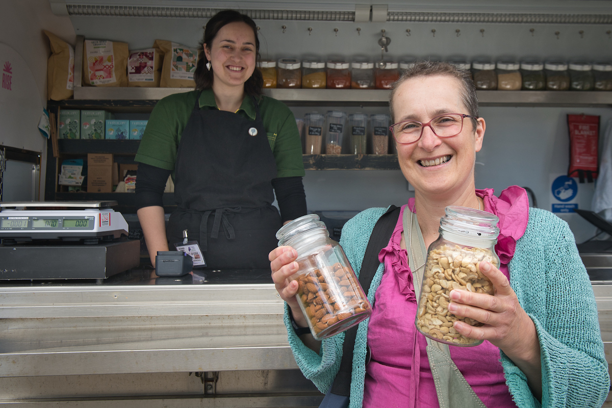 Image of Evie with a customer at Ullapool Unpacked