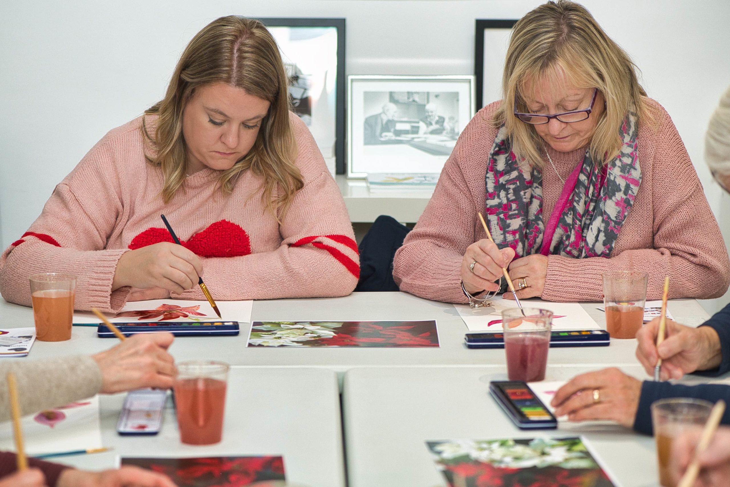 Image of two people painting at Helensburgh Art Hub