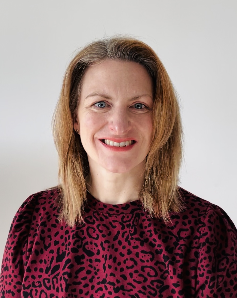 Image of Emily smiling and looking at the camera