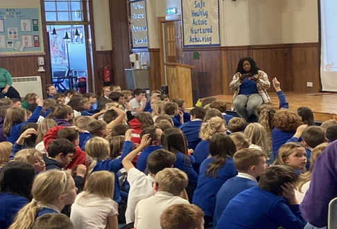 Florence speaking at a school